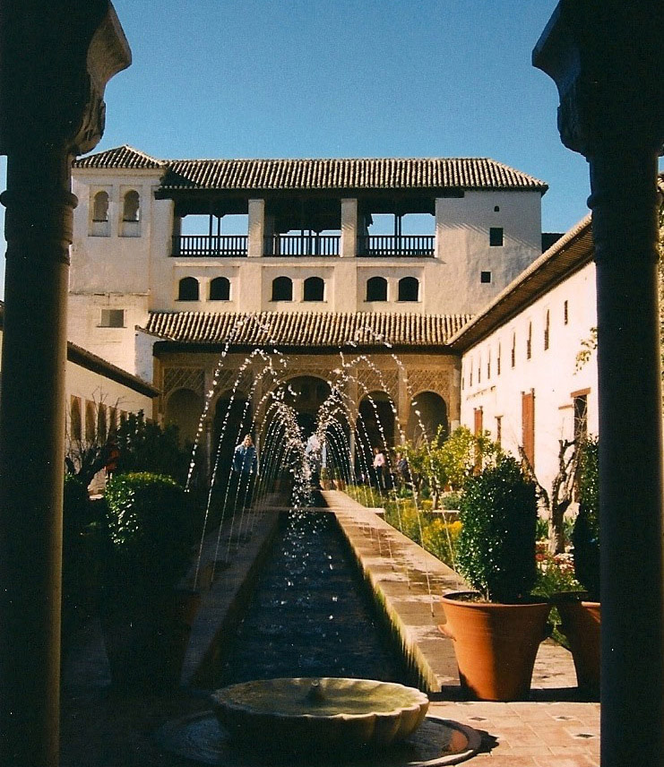A fountain and gardens in the Calat Alhambra in Granada, Spain